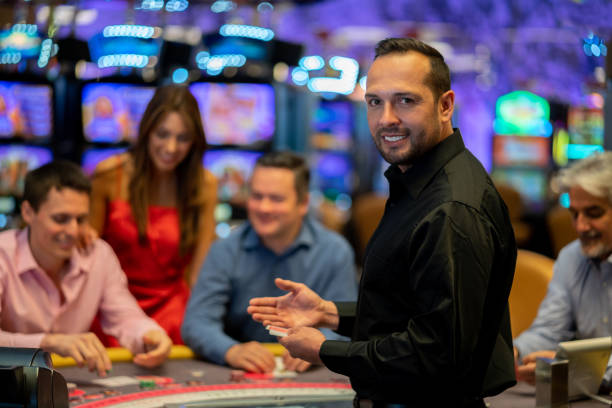 Live dealer at a Number Games table on kakap, showing cards and dice equipment